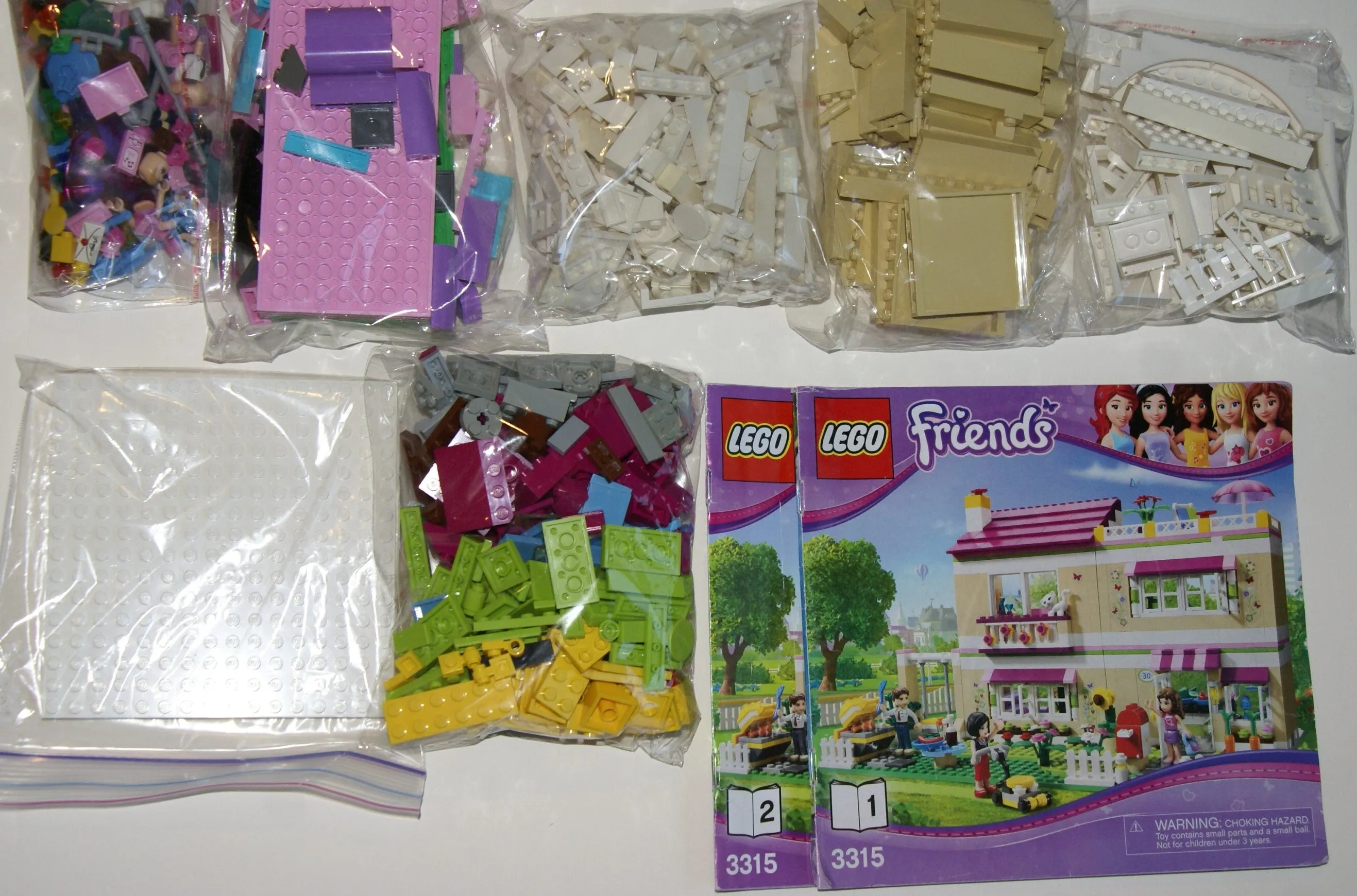 NOW RARE RETIRED LEGO Friends Kit: Olivia’s House (3315) with 3 Minifigures & 1 Cat, kitchen, Living, Bedroom, Bath, Gardens, Barbecue, Patio & Many Accessories. 695 PIECES, YEAR 2012, AGE 6 TO 12. COMPLETE BOX & BOOKLETS, BUILT ONCE
