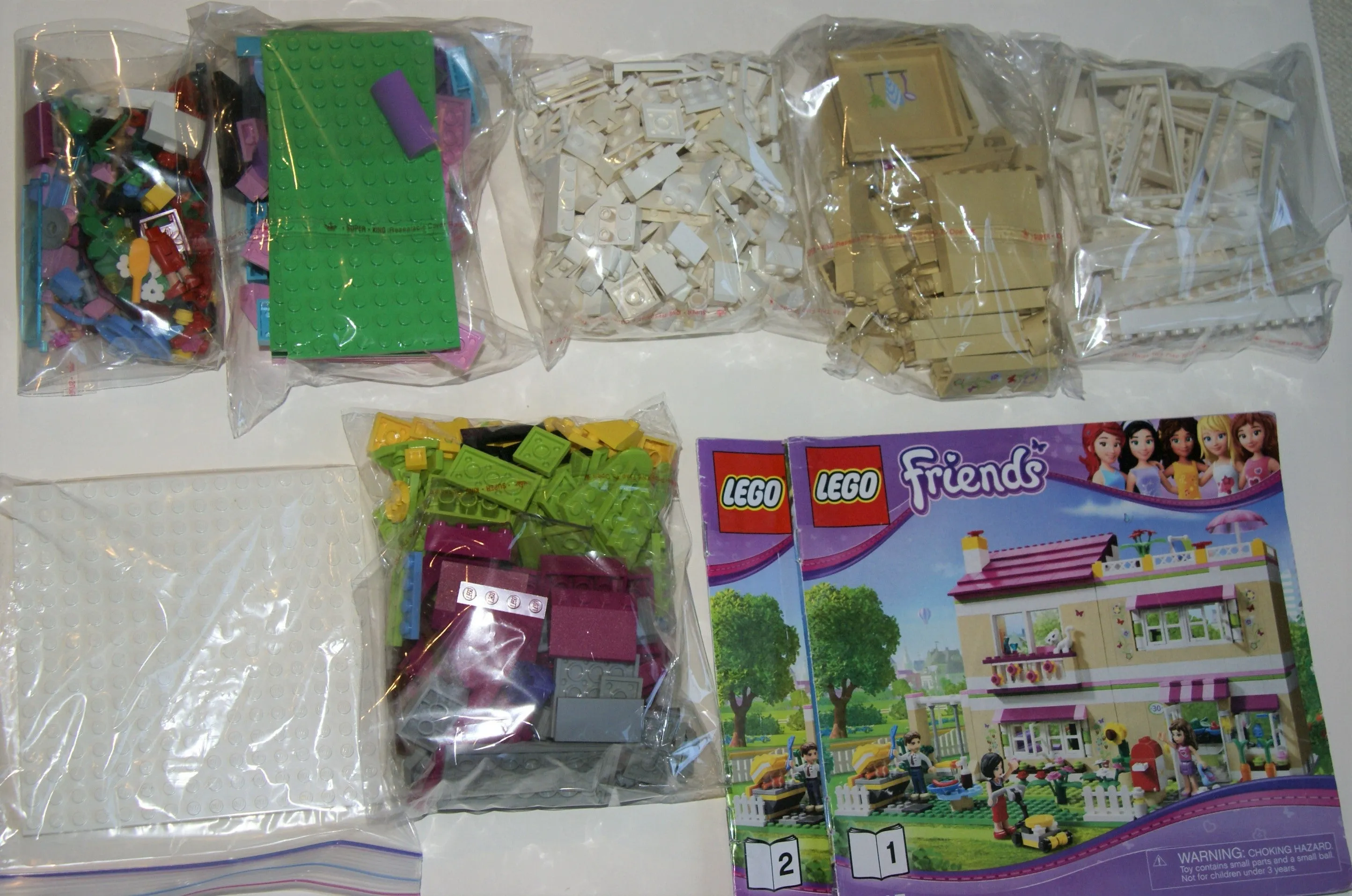 NOW RARE RETIRED LEGO Friends Kit: Olivia’s House (3315) with 3 Minifigures & 1 Cat, kitchen, Living, Bedroom, Bath, Gardens, Barbecue, Patio & Many Accessories. 695 PIECES, YEAR 2012, AGE 6 TO 12. COMPLETE BOX & BOOKLETS, BUILT ONCE